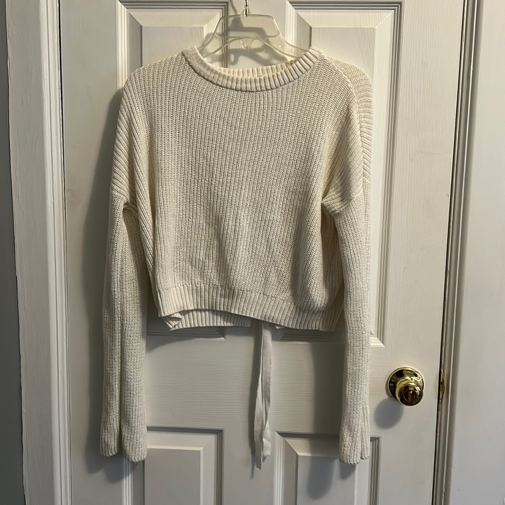 White sweater, flared sleeves, size P/S from GARAGE